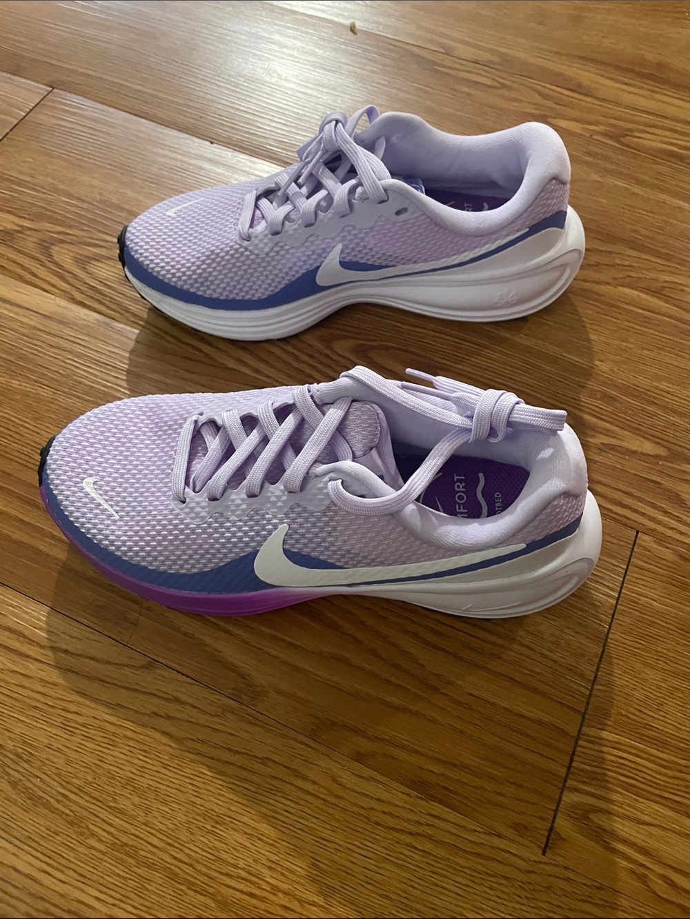 Nike Women's Light Purple Mesh Running Sneakers with White Swoosh
